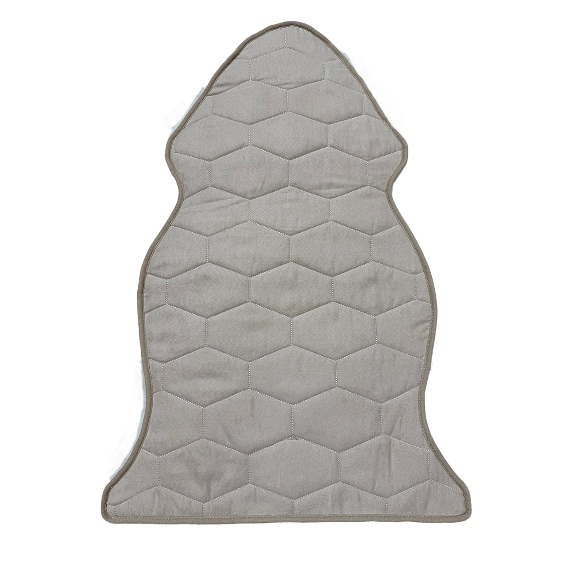 Ivory New Zealand sheepskin rug showing quilted backing
